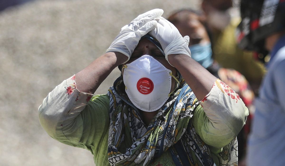 AP PHOTOS: India’s deadly virus surge follows crowded events