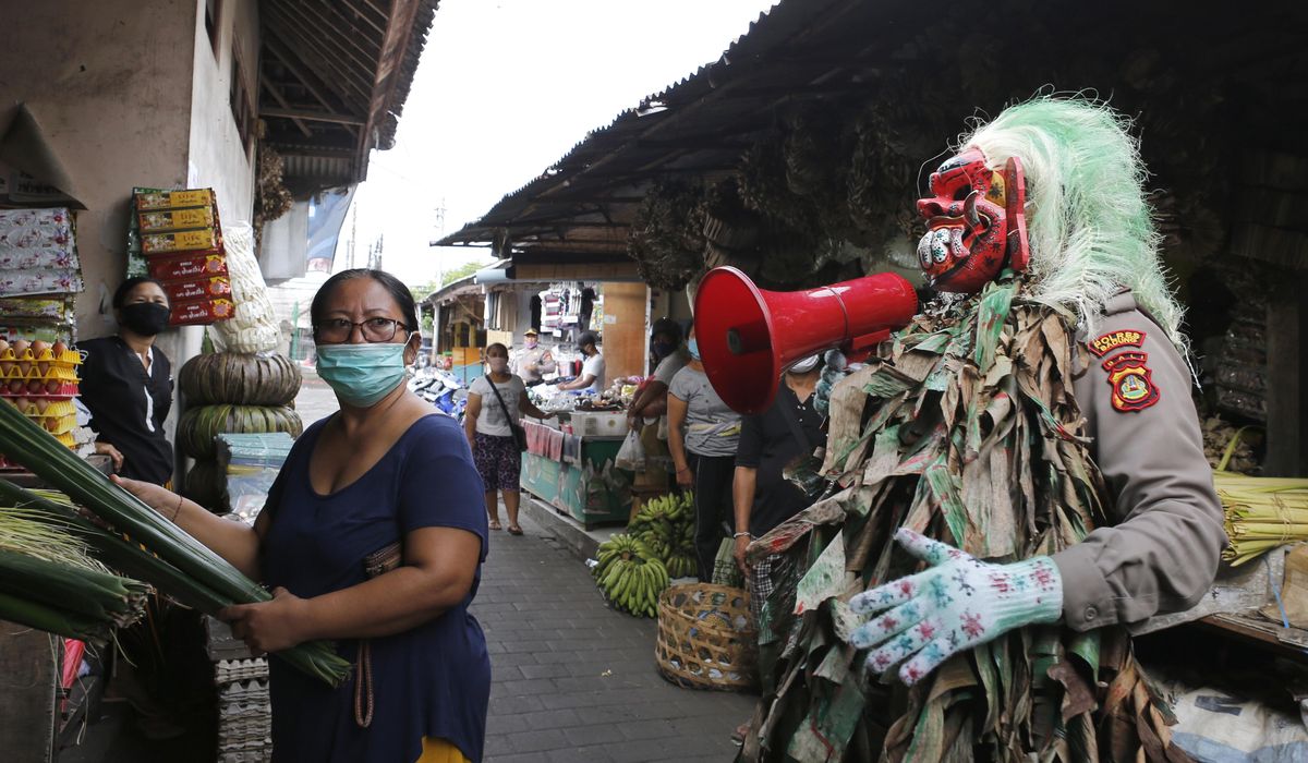 Two influencers ordered off Bali after fake mask video prank