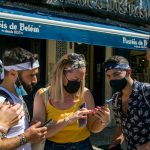 British Tourists Return to Portugal, Unleashed but (Mostly) Masked