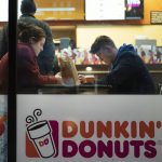 Dunkin’ worker charged in customer’s death