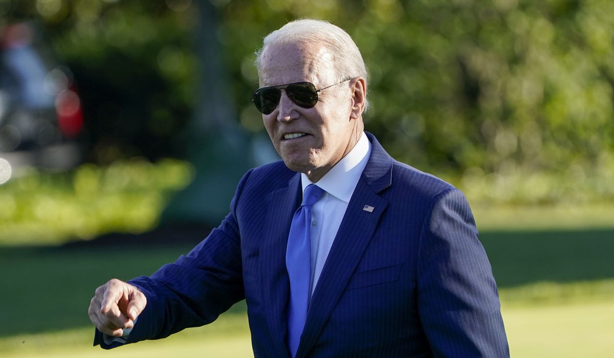 Biden says he didn’t intend a veto threat on new bipartisan infrastructure deal