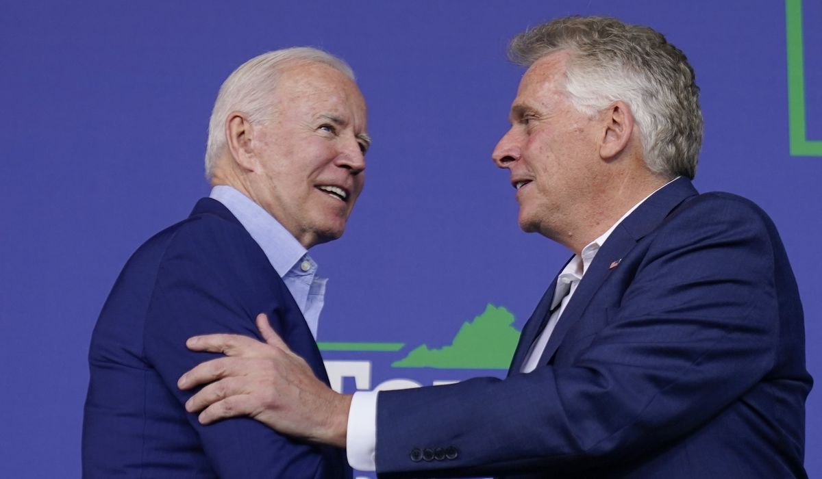 Biden stumps for McAuliffe in early test of political clout