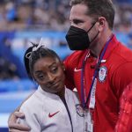 EXPLAINER: How ‘the twisties’ stopped Simone Biles cold