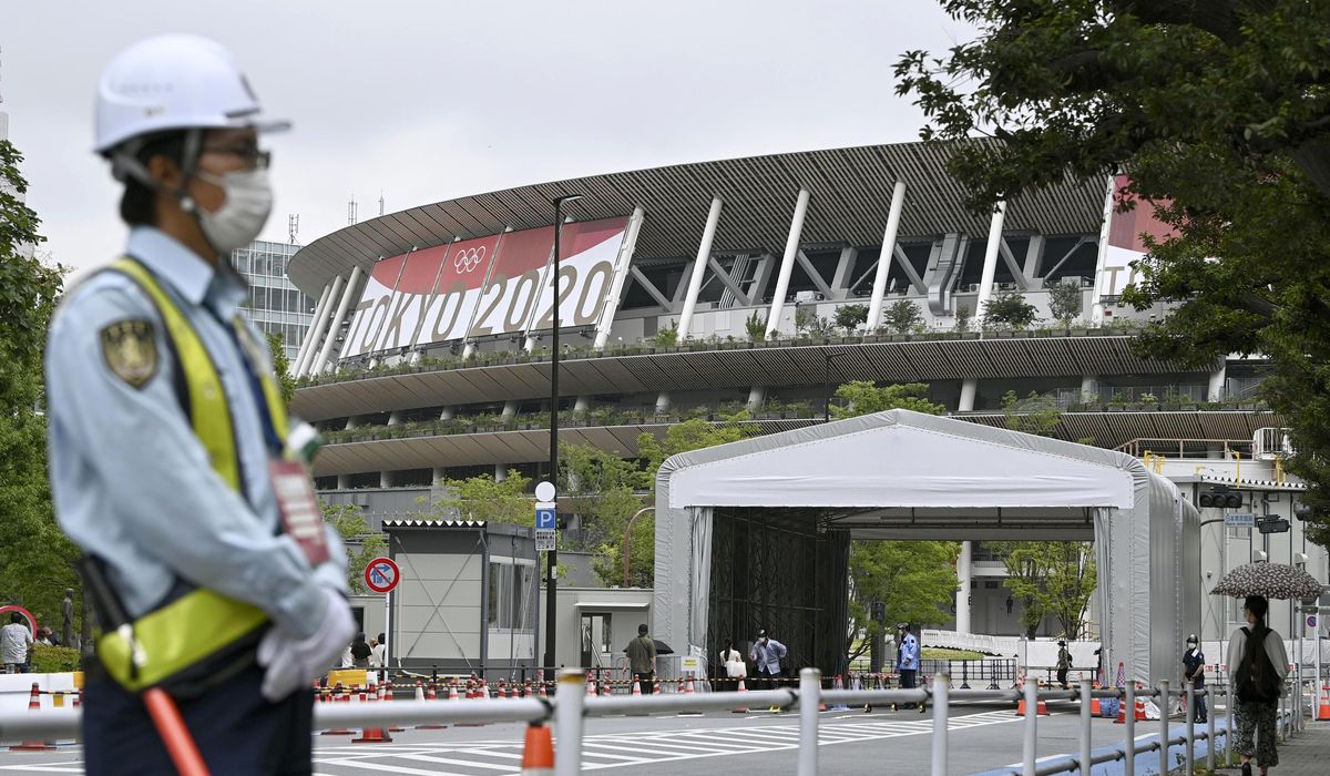 No spectators allowed during Olympics because of virus uptick; Japan declares state of emergency