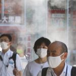 Tokyo logs record 5,042 cases as infections surge amid Olympics