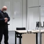 Former Nazi camp secretary in German trial, 96, on the run