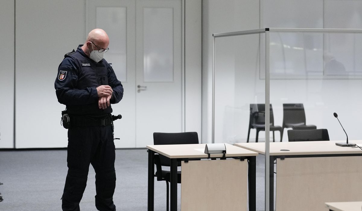 Former Nazi camp secretary in German trial, 96, on the run