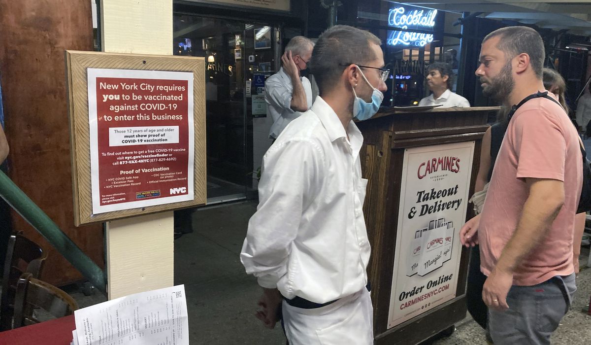 Hostess attacked at Carmine’s used racial slur, suggested vaccination cards were fake: Attorney