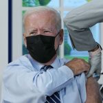 Joe Biden gets a COVID-19 booster shot in front of cameras