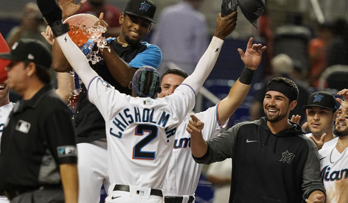 Marlins’ Chisholm HRs twice, scores on wild pitch in 10th in win over Nationals