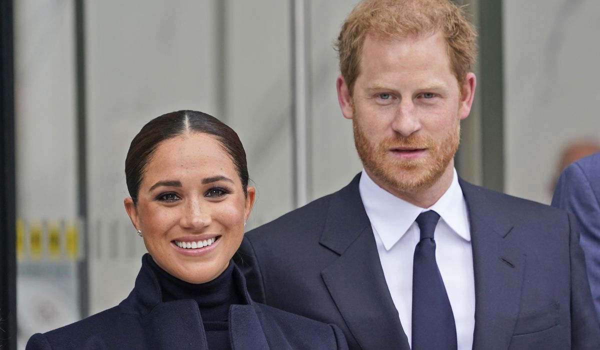 Meghan and Harry visit with students at a Harlem school