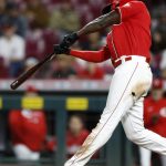 Reds beat Nationals 8-7 in 11 but fall further behind Cards