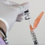 White evangelicals lag in COVID-19 vaccine uptake, survey finds