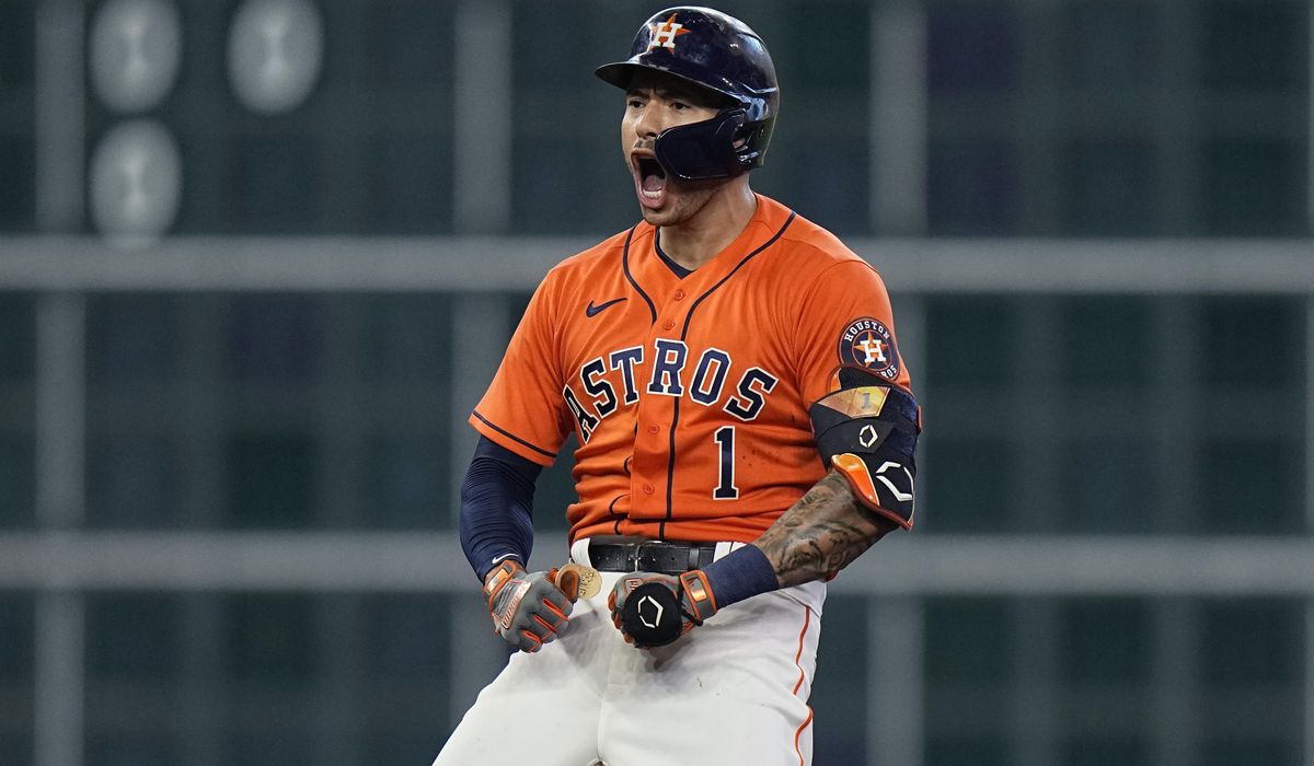 Correa, Alvarez help Astros take 2-0 lead over Sox in ALDS