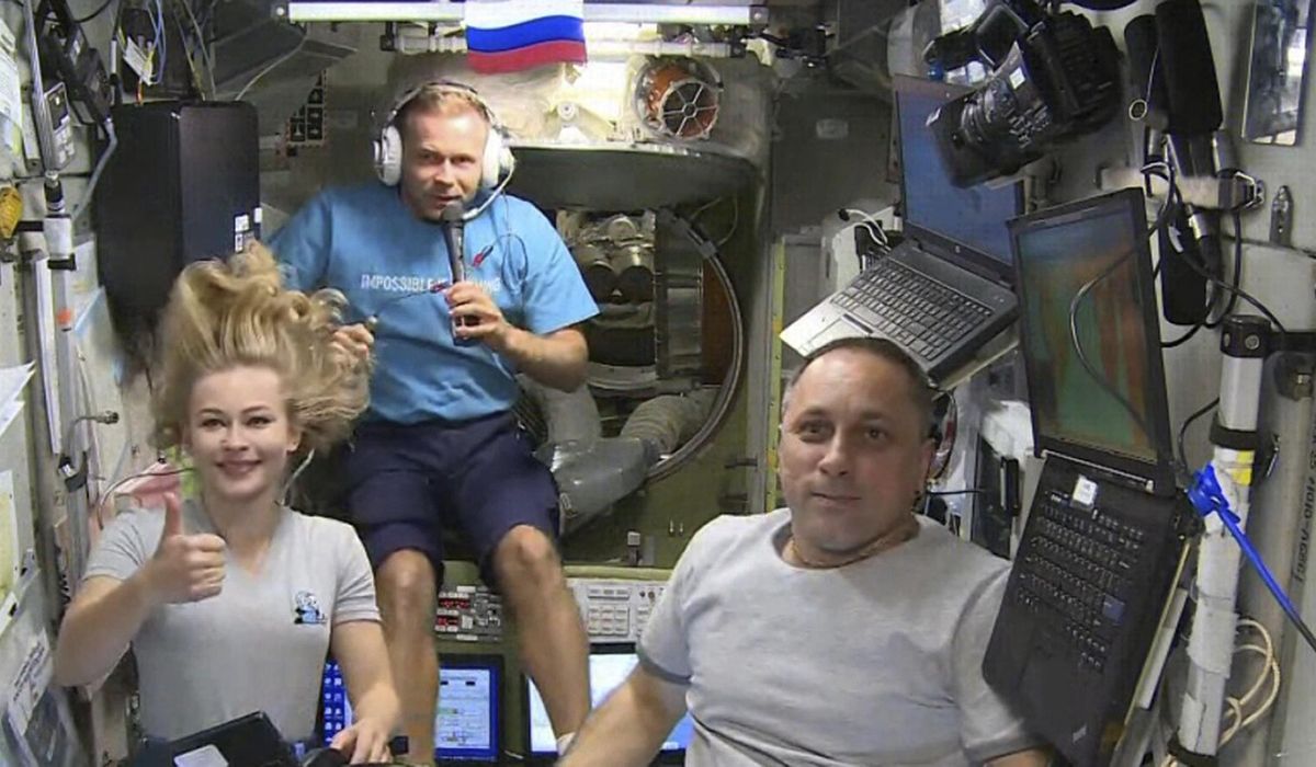 Russian filmmakers land after shoot aboard space station