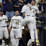 Tellez HR, throw spark Brewers over Braves 2-1 in Game 1