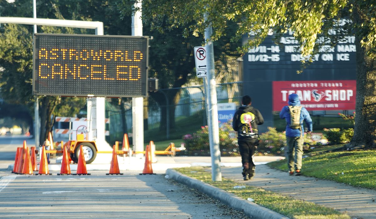 Rapper Travis Scott said he is ‘devastated’ by what took place at Astroworld Festival