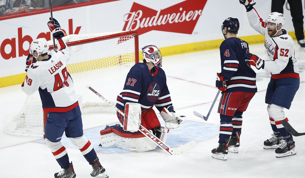 Caps beat Winnipeg 5-2, spoil Lowry’s debut as Jets coach