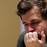 Carlsen keeps lead in world chess title fight after tame Game 7 draw