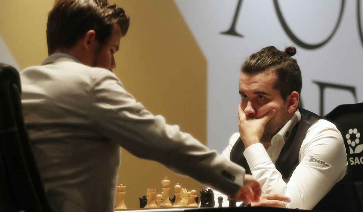 Carlsen seizes two-game lead in chess title fight after Russian’s blunder