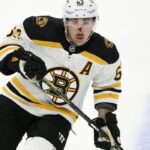 Marchand bloodied, scores twice in Bruins’ 7-3 win over Caps