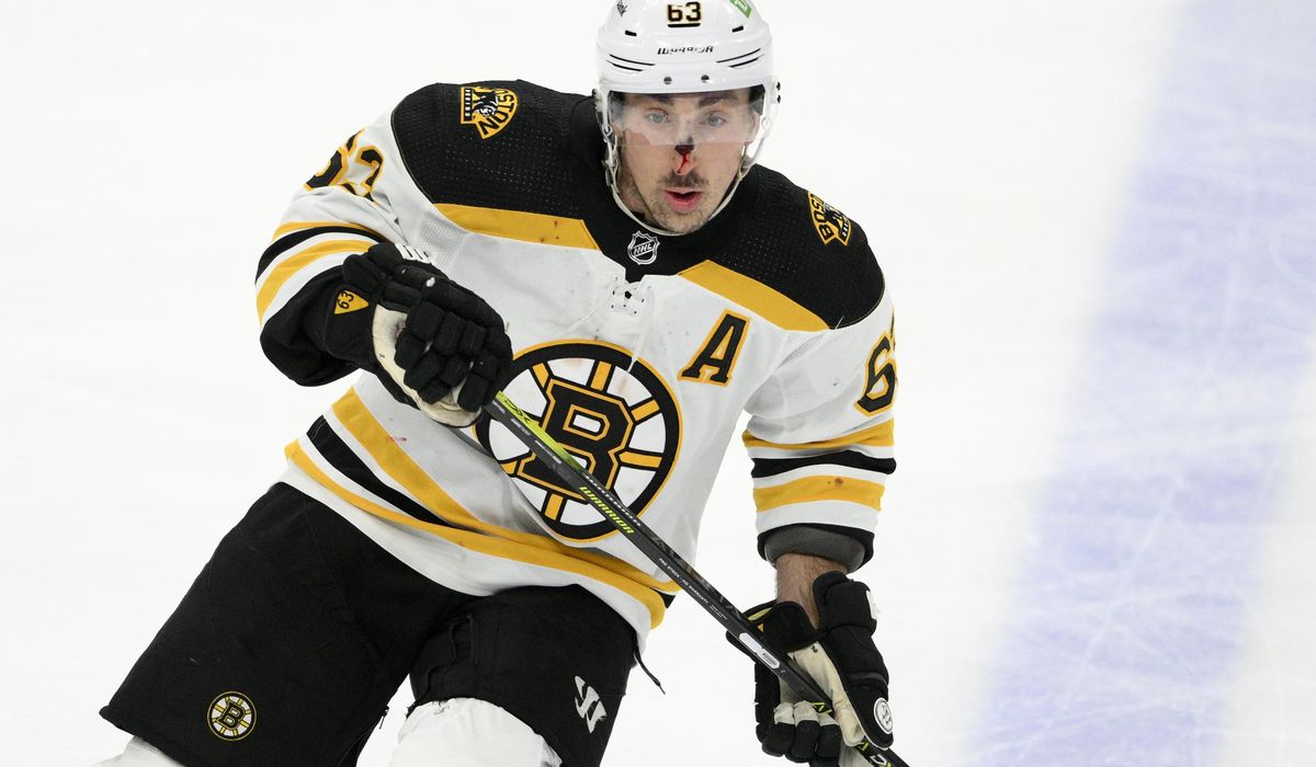 Marchand bloodied, scores twice in Bruins’ 7-3 win over Caps