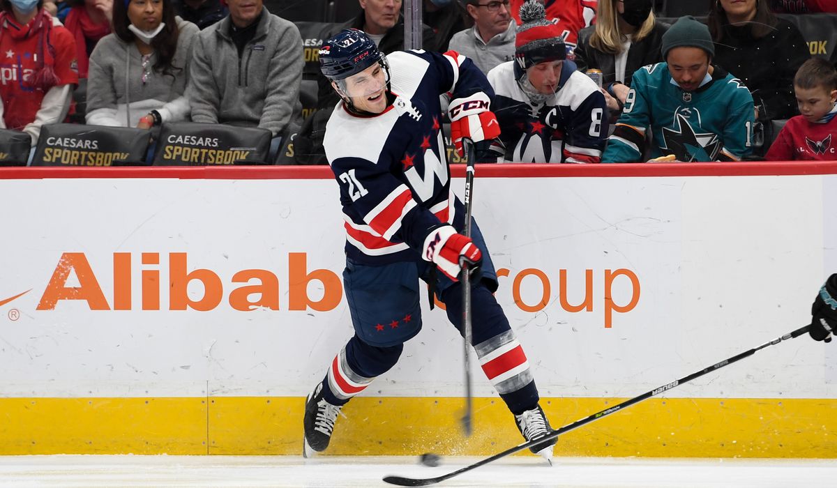 Big hit: Garnet Hathaway flips Evander Kane into bench during Capitals’ loss to Oilers