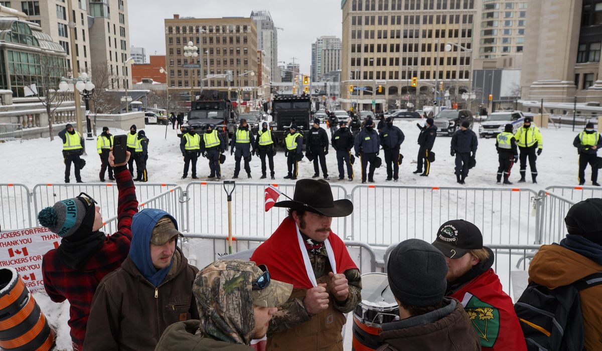 Canadian police clear Parliament street to end siege